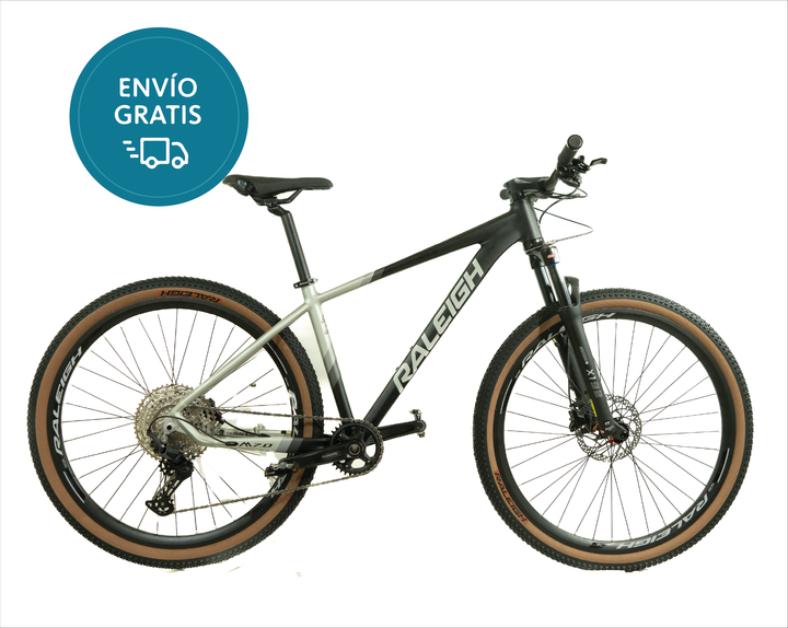 Bicicleta Raleigh Mojave 7.0_Talle: 17"/M _ Negro/Gris /Cuadro de Aluminio/12Vel Shimano/MonoPlato/ Rodado 29 / Línea 2026. - Vista 1