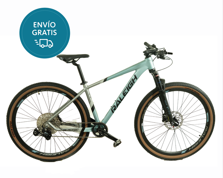 Bicicleta Raleigh Mojave 7.0_Talle: 19"/L _ Celeste/Gris /Cuadro de Aluminio/12Vel Shimano/MonoPlato/ Rodado 29 / Línea 2026. - Vista 1