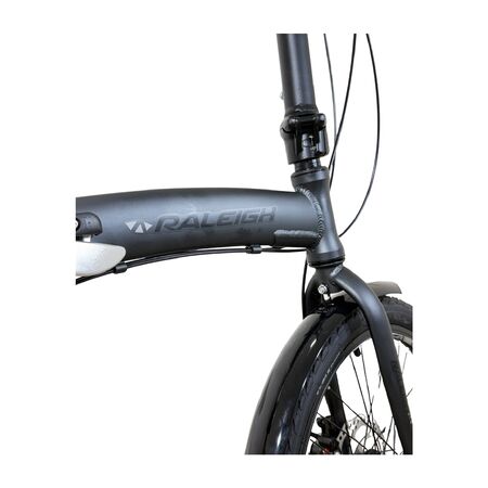 Bicicleta Plegable Raleigh Curve / Negro / Cuadro de aluminio / Frenos a disco mecanico / 6Vel. / Rodado 20".