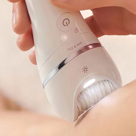 Depiladora Philips Bre700/00 Wet & Dry + 2 Accesorios Blanco Blanco