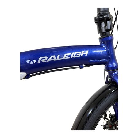 Bicicleta Plegable Raleigh Curve / Azul / Cuadro de aluminio / Frenos a disco mecanico / 6Vel. / Rodado 20".