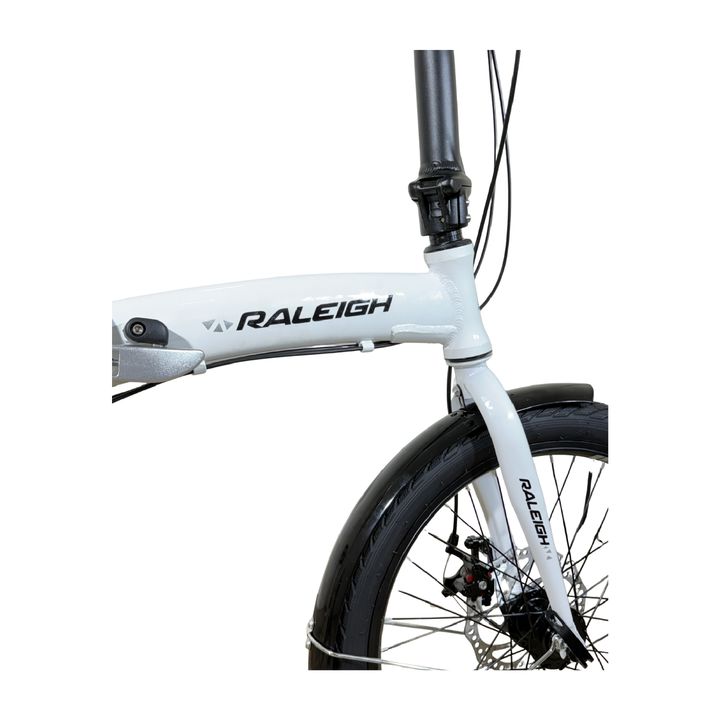 Bicicleta Plegable Raleigh Curve / Blanco / Cuadro de aluminio / Frenos a disco mecanico / 6Vel. / Rodado 20". - Vista 3